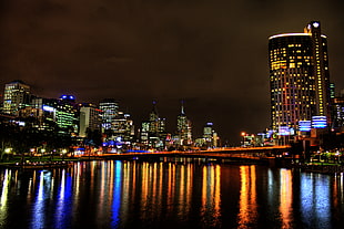 silhouette of city skyline during nighttime, melbourne, yarra river HD wallpaper