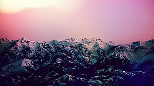 high-saturation photography of snow-coated mountain peak