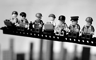 grayscale photo of Lego Minifugure toys, LEGO, skyscraper, parody, monochrome