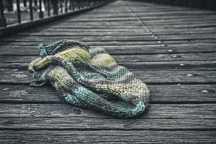 green and teal knit textile