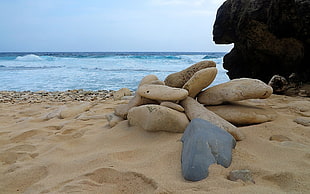 brown rocks, Aruba, beach, stones, sea HD wallpaper