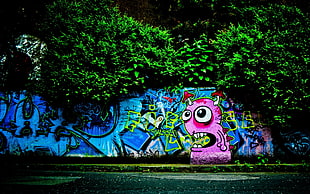 blue and pink graffiti wall