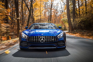 blue Mercedes-Benz sports car time lapse photography