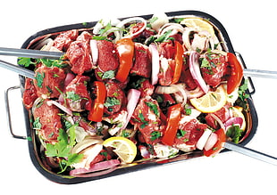 vegetable salad on black tray
