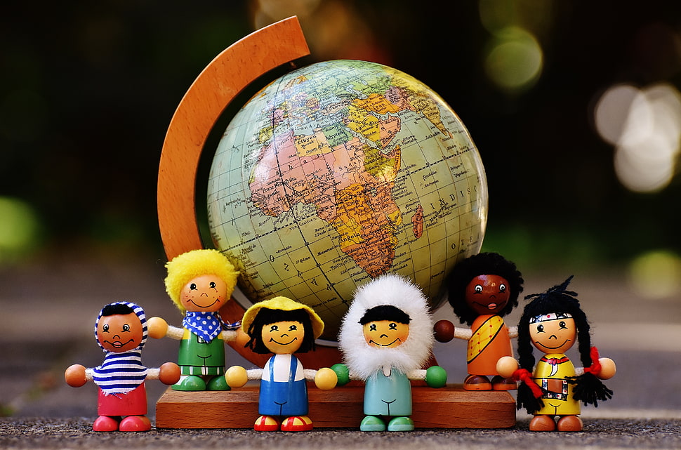 assorted toy figure and desk globe HD wallpaper