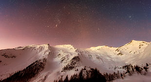 white mountain during night time shot