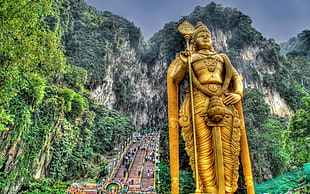 Hindu Deity statue with background of mountain