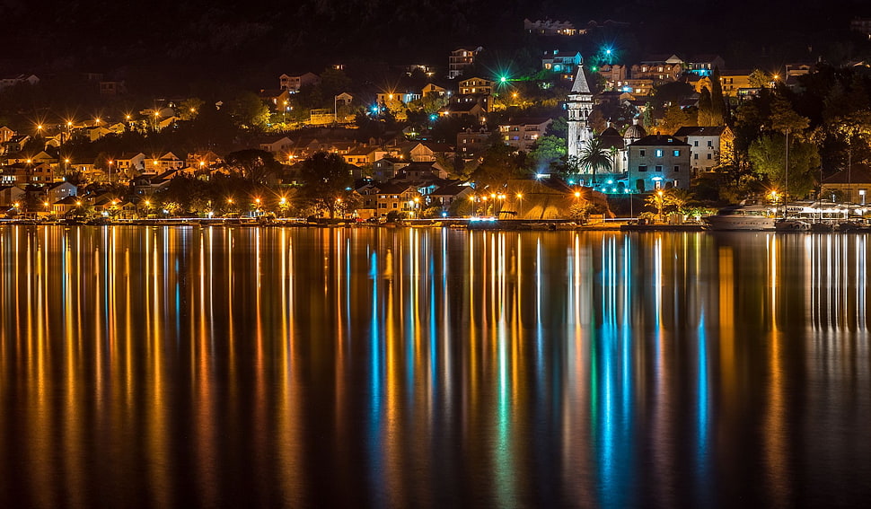 cityscape over body of water during night, cityscape, night, lights, building HD wallpaper