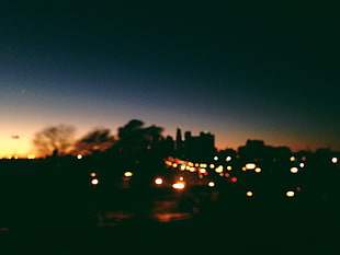 silhouette buildings, City, Blur, Glare HD wallpaper