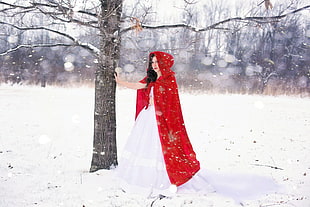 woman wearing little red riding hood costume