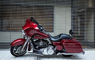 red and silver touring motorcycle