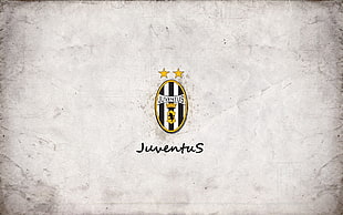 white, black, and yellow Juventus logo