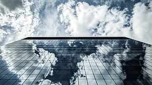 white and black wooden table, skyscraper, architecture, shadow, clouds