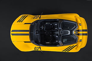 yellow convertible sports car