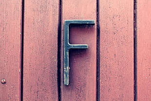 black steel letter-F signage