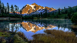 rocky mountain and body of water photo, mount shuksan