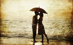 man and woman kissing under umbrella painting
