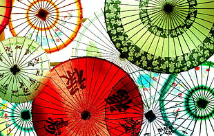 assorted-color floral kanji labeled paper umbrellas