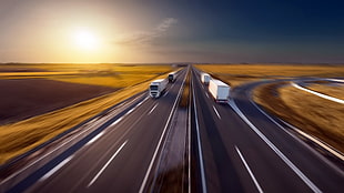brown and black wooden table, trucks, road, motion blur