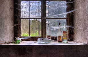 brown wooden framed glass window, window, bottles