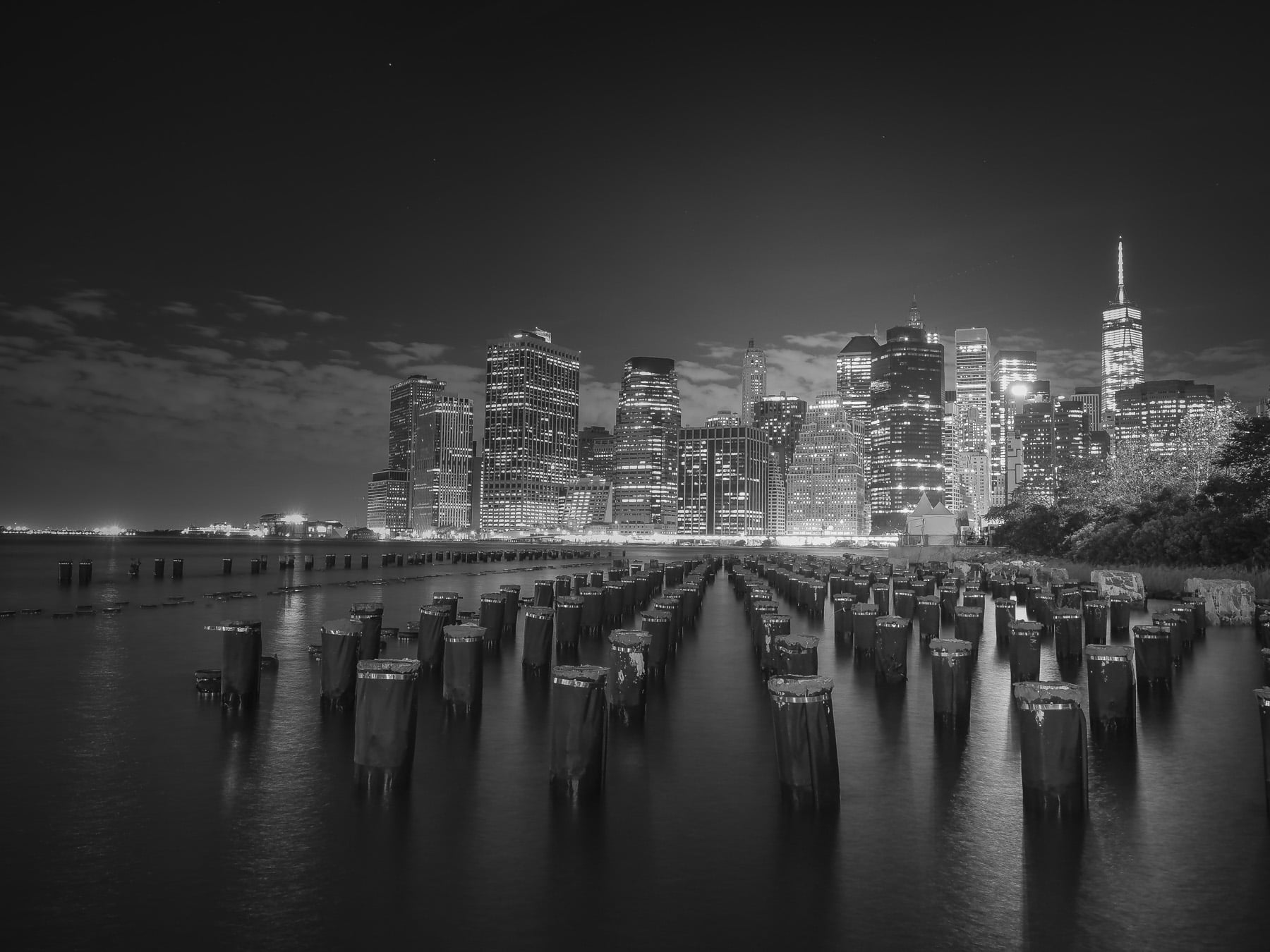 gray scale photo of high rise city buildings