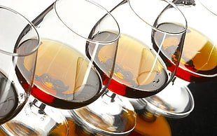 four wine glasses filled HD wallpaper