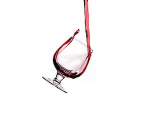 clear wine glass with red wine