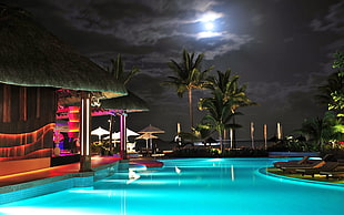 landscape photography of swimming pool at nighttime