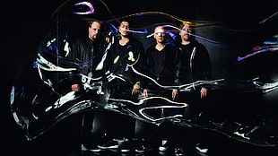 four men wearing black jackets HD wallpaper