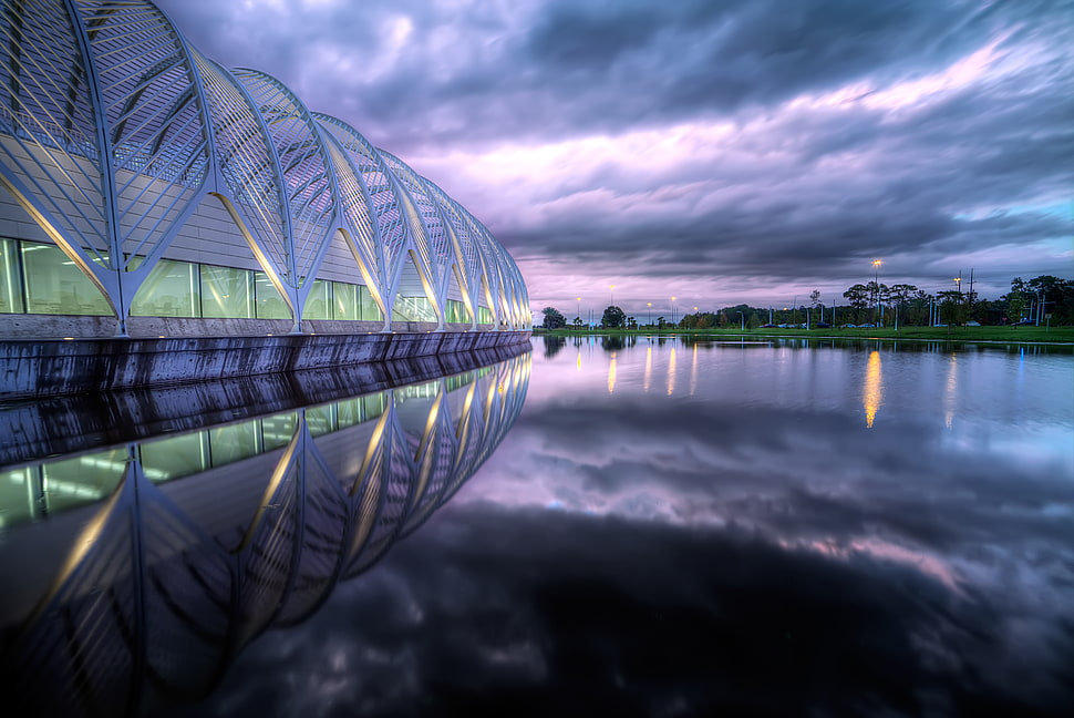 gray metal framed structure under gray sky during night time, florida HD wallpaper