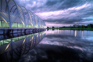 gray metal framed structure under gray sky during night time, florida