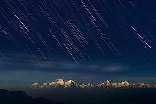 meteor shower on mountains HD wallpaper