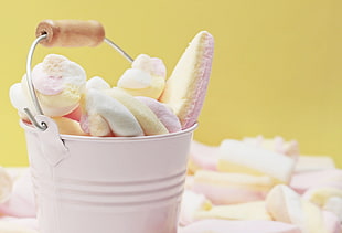 white steel bucket with marshmallows on top