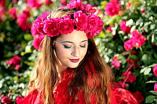 woman wearing red dress and pink flower headdress
