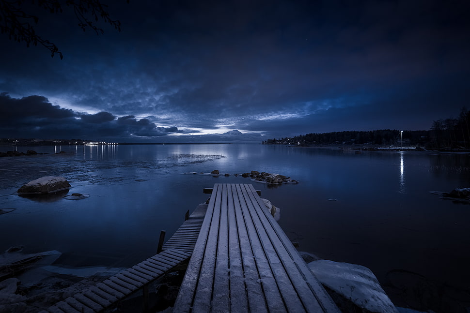 brown wooden dock under black sky during night time HD wallpaper