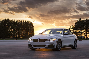 gray BMW F30 during sunset