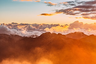 mountain under blue and white sky HD wallpaper