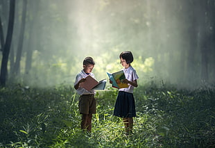 boy and girl wearing School Uniform Studying at forest during daytime HD wallpaper