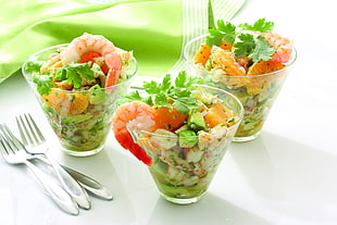 three glass full of vegetables with shrimp and green mint on top HD wallpaper