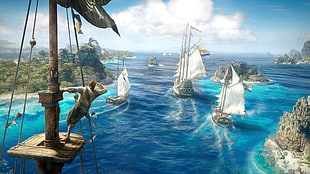 three sail boats on body of water