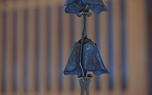 blue metal pendant decoration, blossoms, bokeh