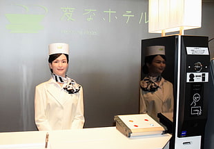 woman in white desk officer uniform standing
