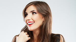 smiling woman in black top
