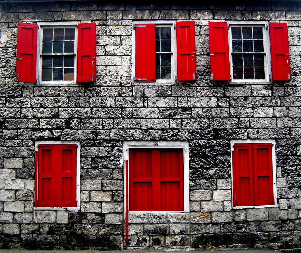 six gray and red windows of building HD wallpaper
