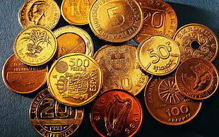 round gold Espana coins lot HD wallpaper