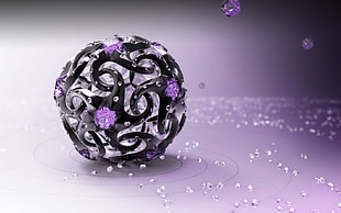 round black and purple studded ornament
