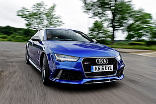 timelapse photography of blue Audi RS along highway HD wallpaper