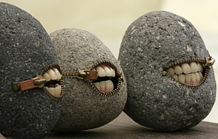three grey stone fragments, rock, stone, humor, minimalism