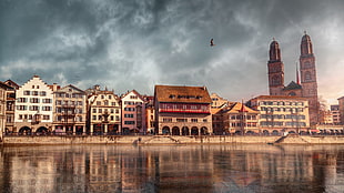 body of water and brown concrete buildings, architecture, building, old building, clouds HD wallpaper