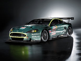 green Aston Martin sports coupe